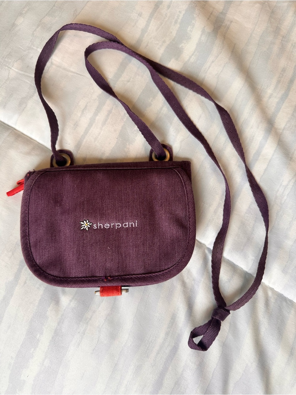Sherpani Plum Purple Crossbody Bag with Red Accent